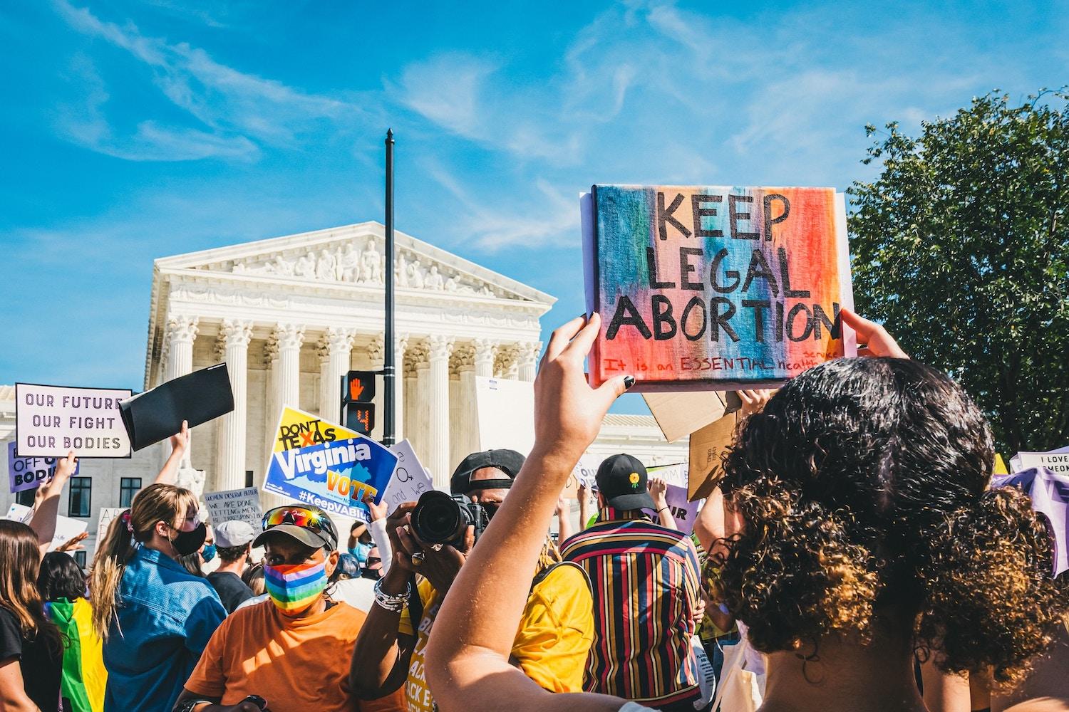 protest for reprodutive rights in washington dc - protester holds sign that reads keep legal abortion